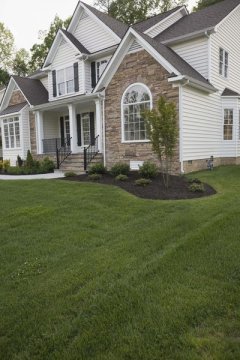 Curved beds add interest to the landscape design.