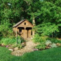 rustic garden cottage wooden garden shed pavement