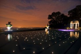 Swimming pool fiber optic floor lighting