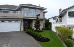 White Rock home after yard makeover by Fabulous Flower Beds